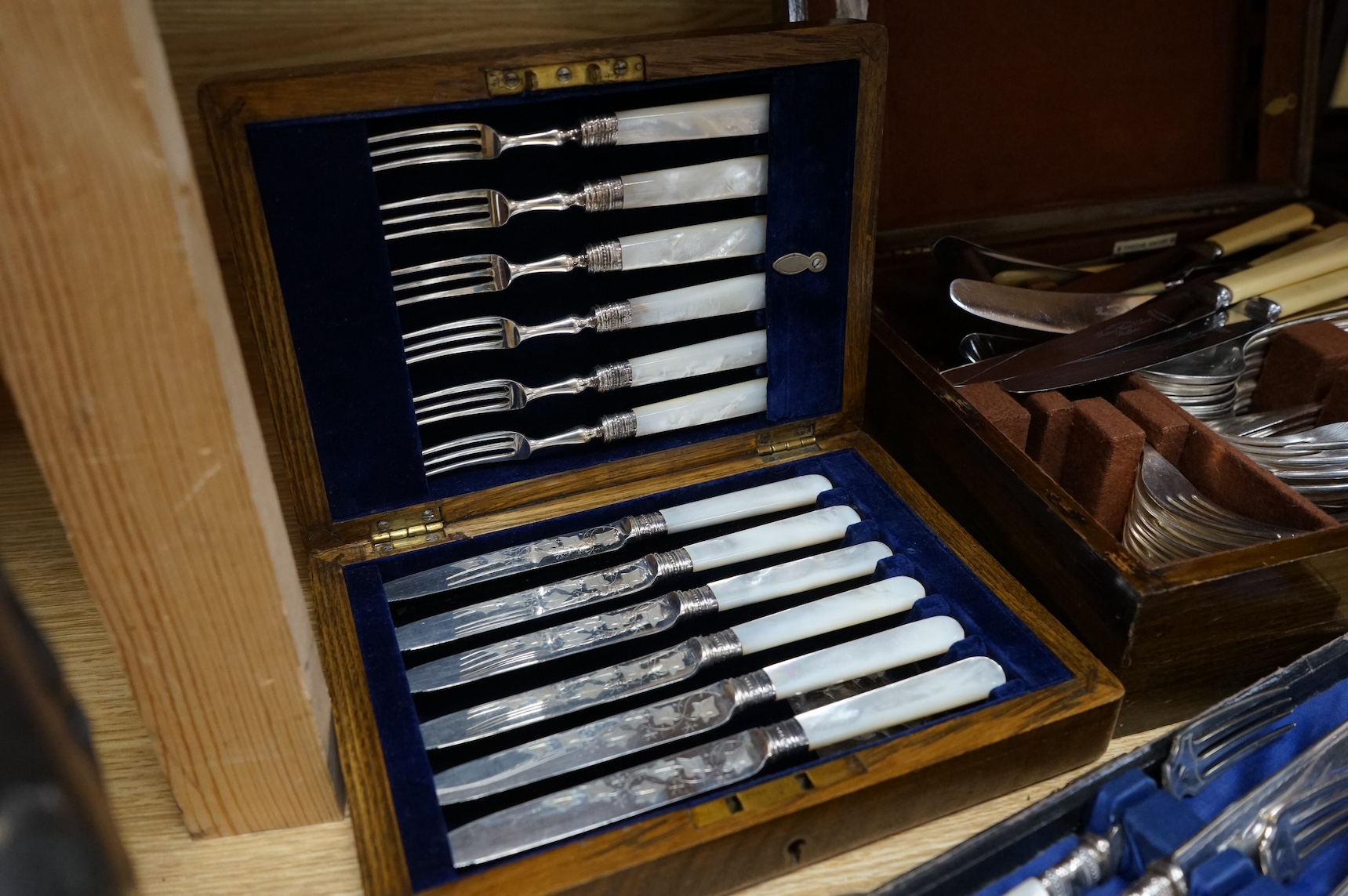 A group of assorted cased plated flatware and a cased set of six Edwardian silver teaspoons by Charles Wilkes, Birmingham, 1904. Condition - fair